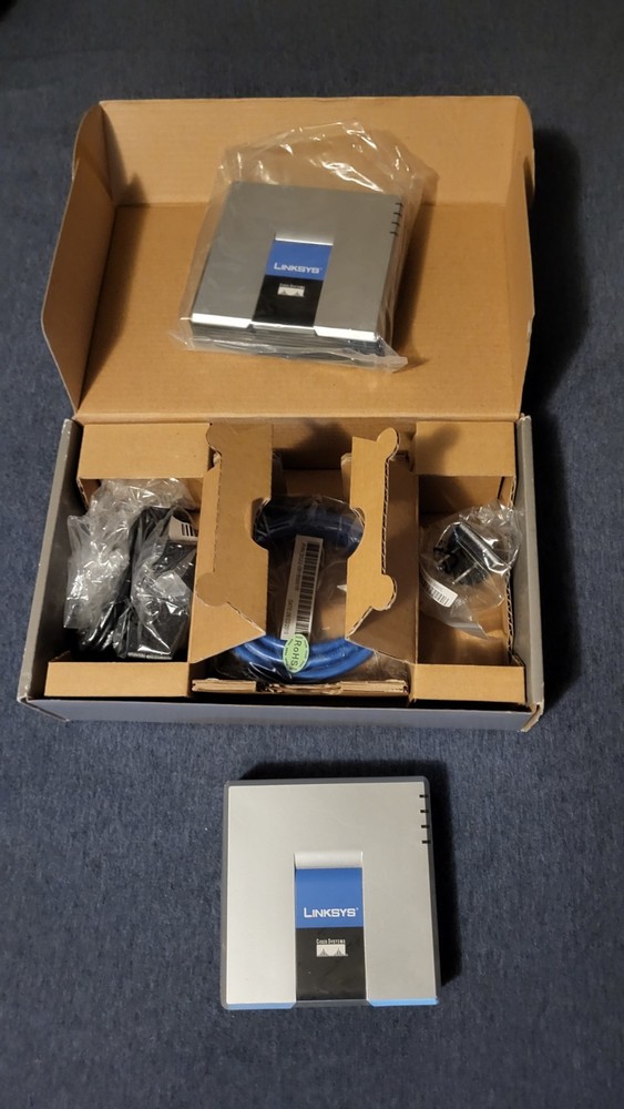 Misc. Network Equip. - Router, Switch, 2 Ethernet Extenders, 2 VoIP, EasyJack2