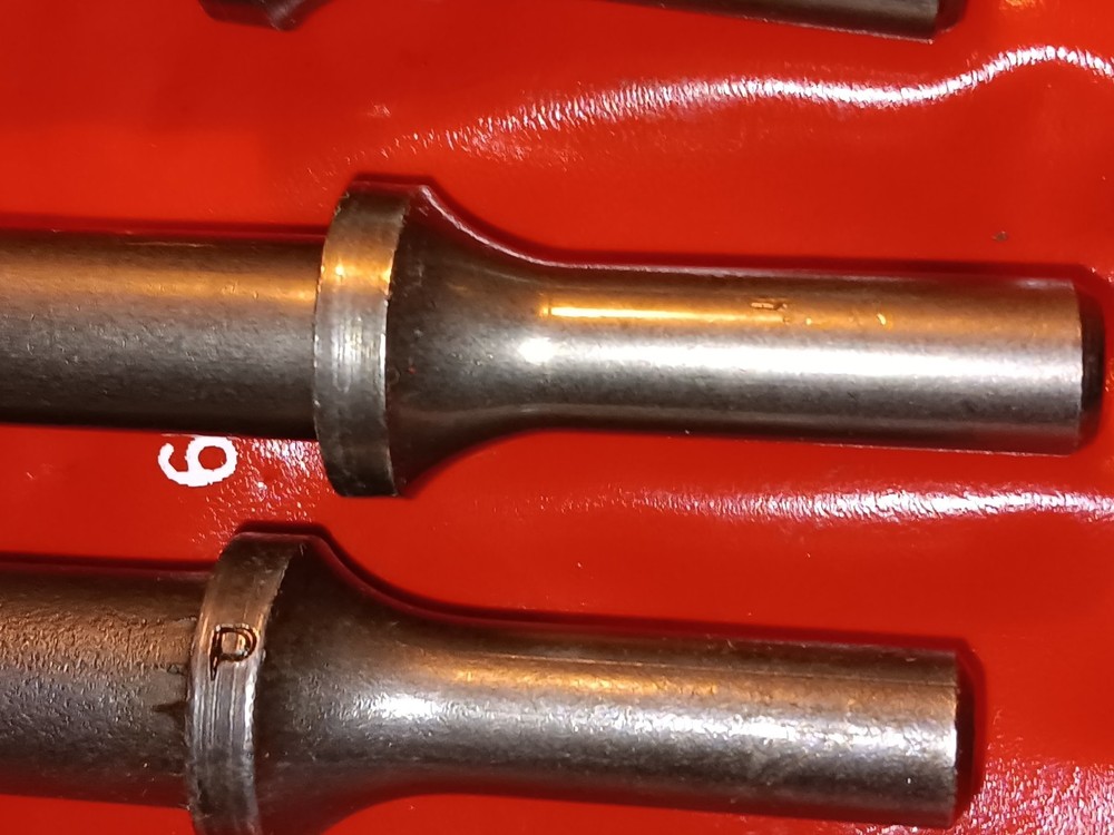 P t c six piece air chisel , set. Q Quick change.