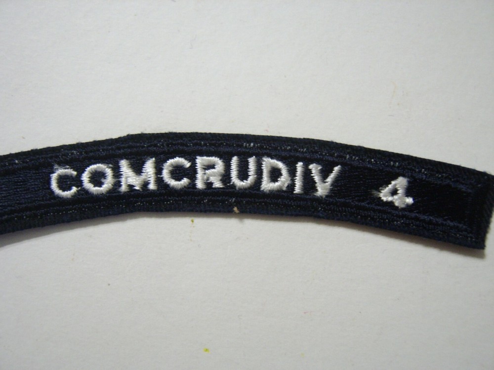COMCRUDIV 4  -  UIM SHOULDER TAB PRE-1975