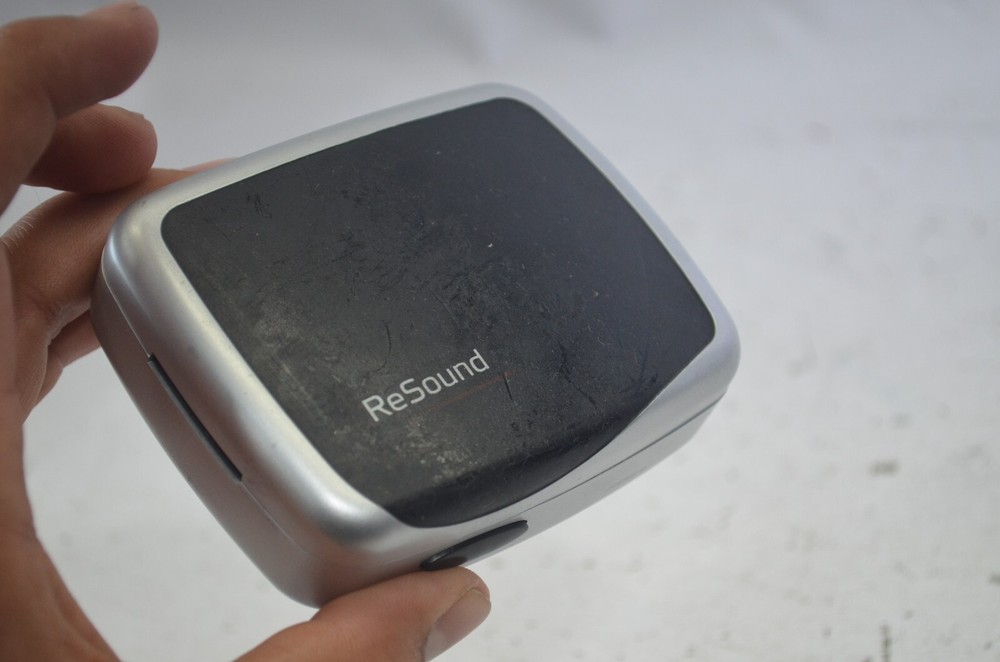 Resound Hearing Aids as is not tested missing button , might affect function