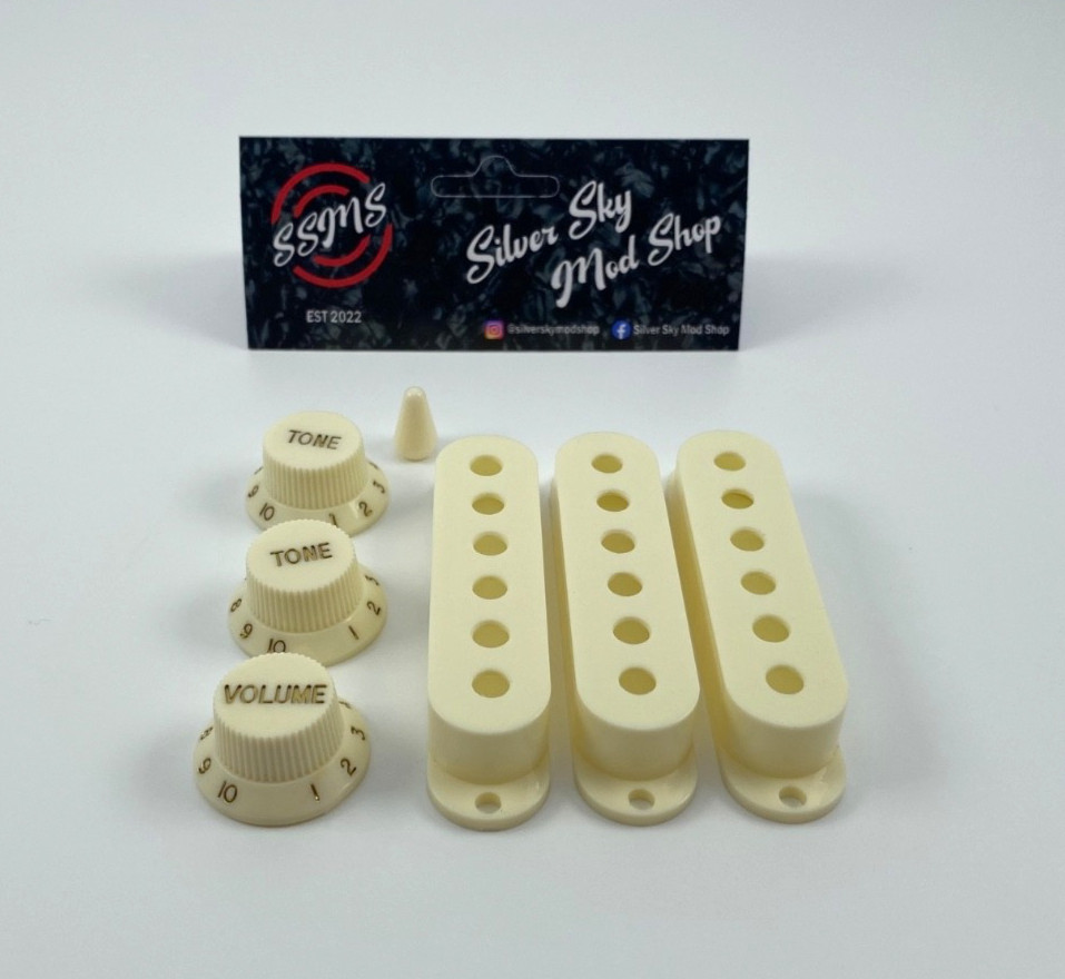 Silver Sky pickup covers, knobs and swicth parchment