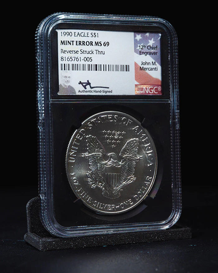 1990 SE $1 NGC MS69 Reverse Struck Thru Error John Mercanti Autographed