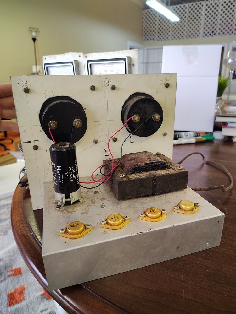 custom-built power supply fixture featuring Simpson Model 59 panel meters.