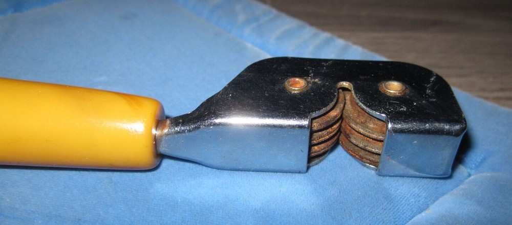 Vintage butterscotch Bakelite handle pull through knife sharpener