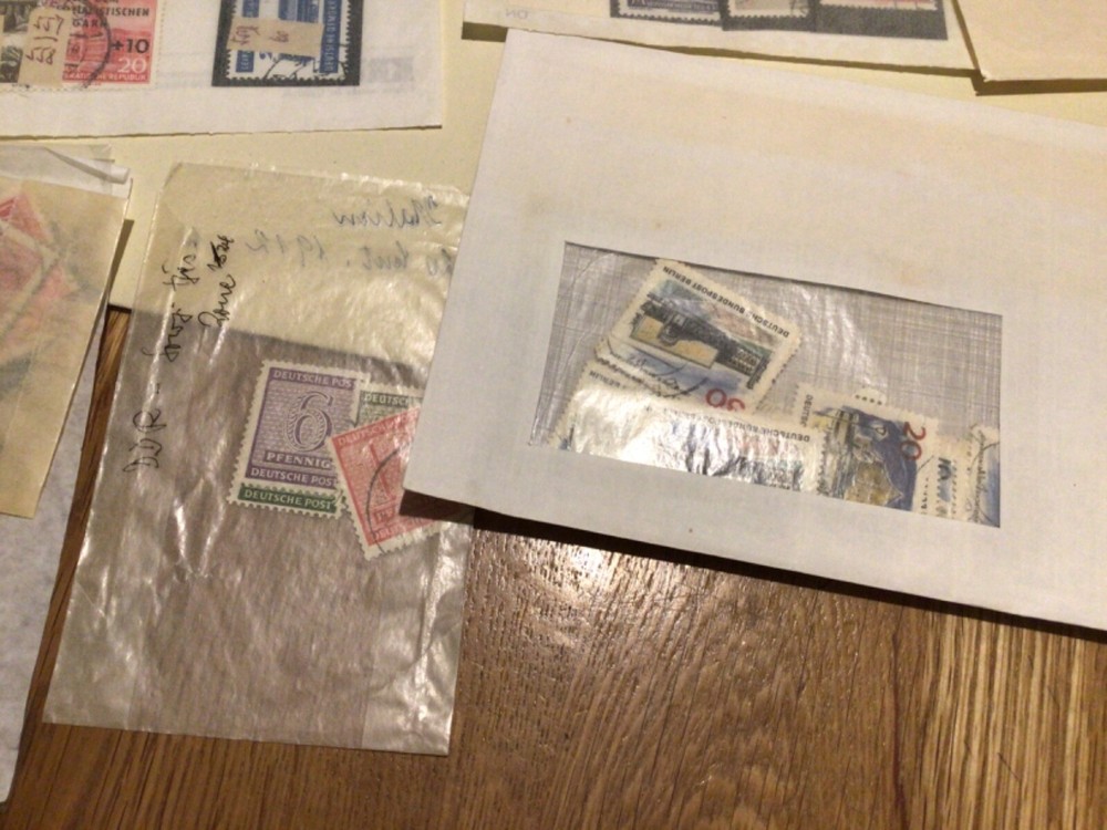 German & DDR mixed stamps in packets A9431