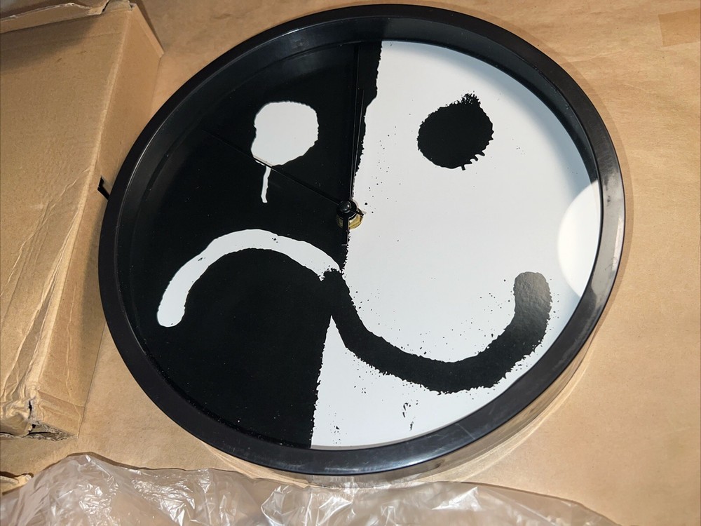 Two Smiley/Frown Wall Clocks - 9.75” Diameter