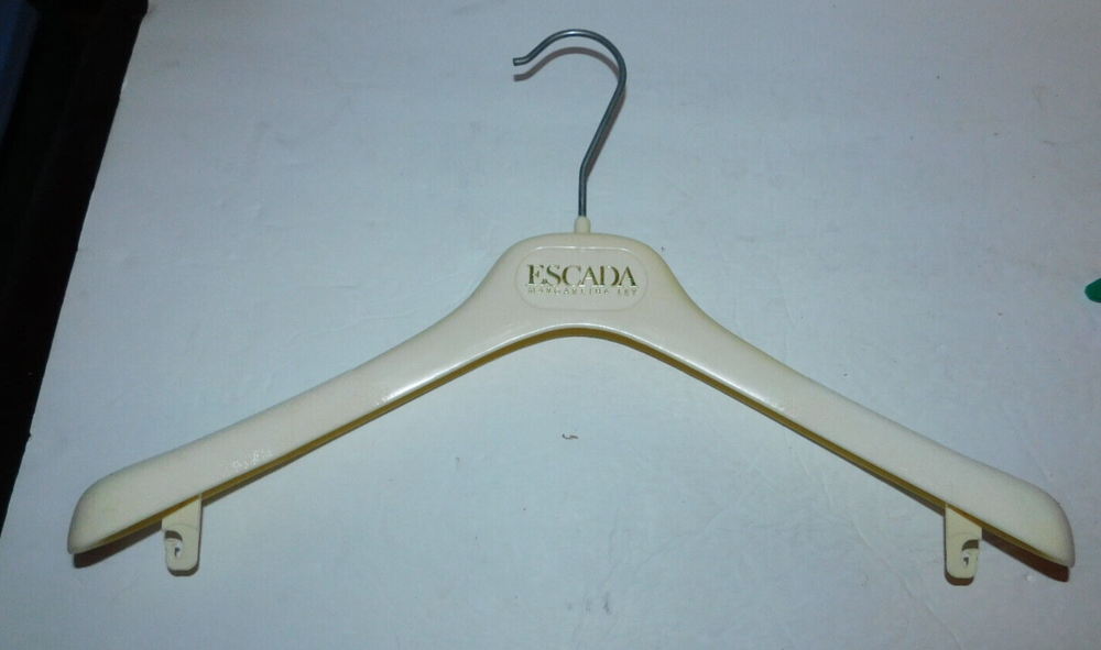 NICE IVORY COLOR PLASTIC ESCADA CLOTHES HANGER