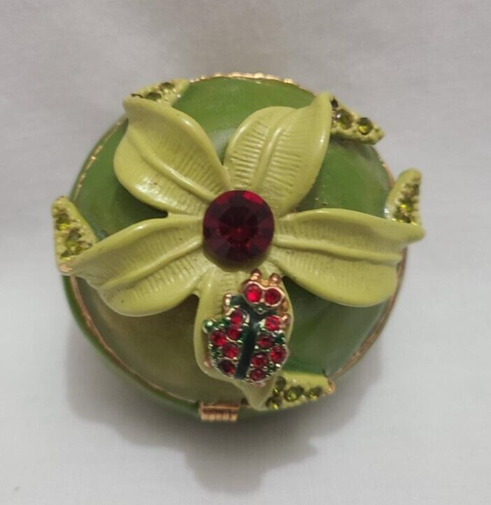 Orrefors pills box with flower and ladybug