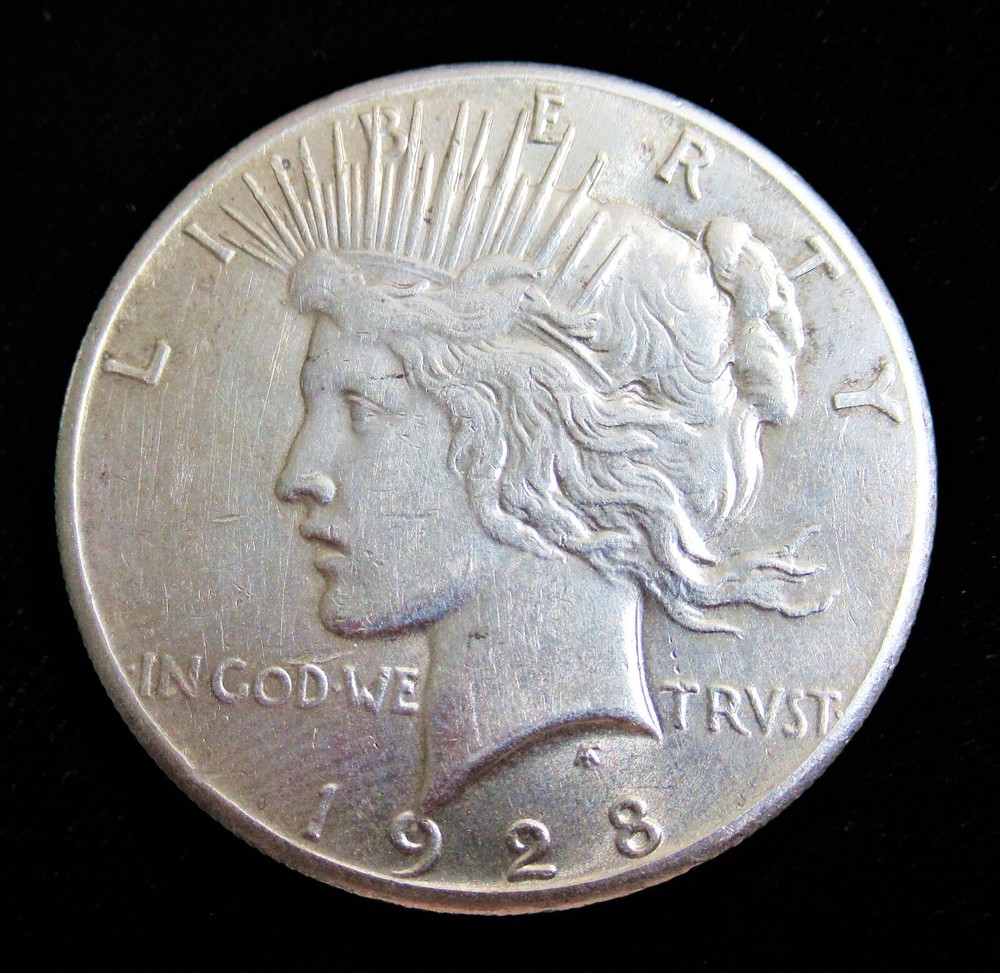 1928 Peace Dollar. RARE DATE! High Grade!
