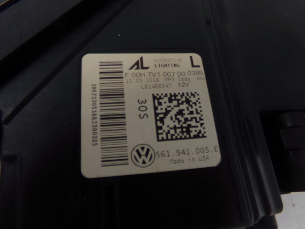 This is a Driver Left Headlight Halogen Fits 16-19 PASSAT