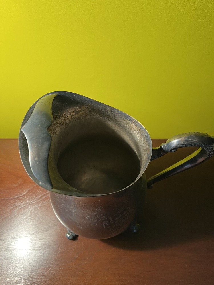 vintage silver soldered pitcher 9” tall