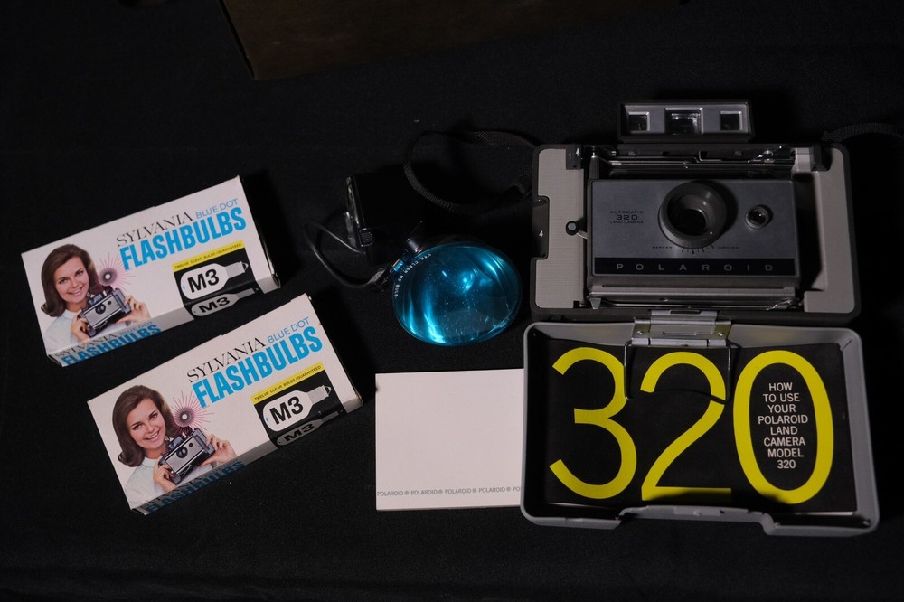 Vintage Automatic Polaroid Land Camera 320 with Case, Flash & Flashbulbs