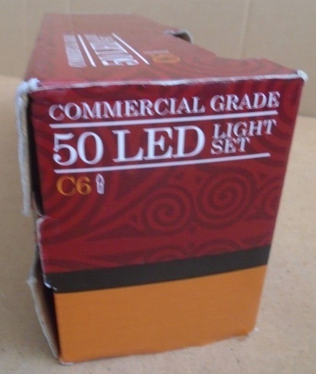 VICKERMAN Commercial Grade C6 String Light Set 50 LED Orange Light White Wire