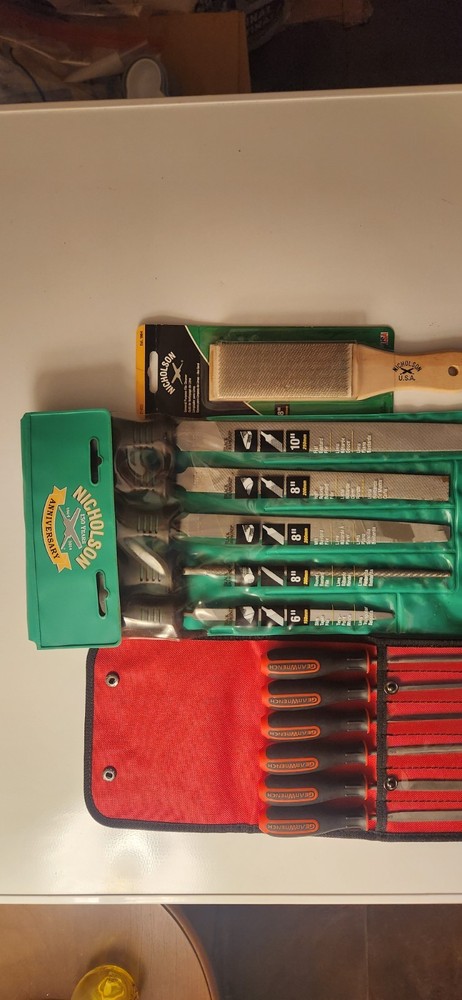 2 file sets and a cleaning brush for them