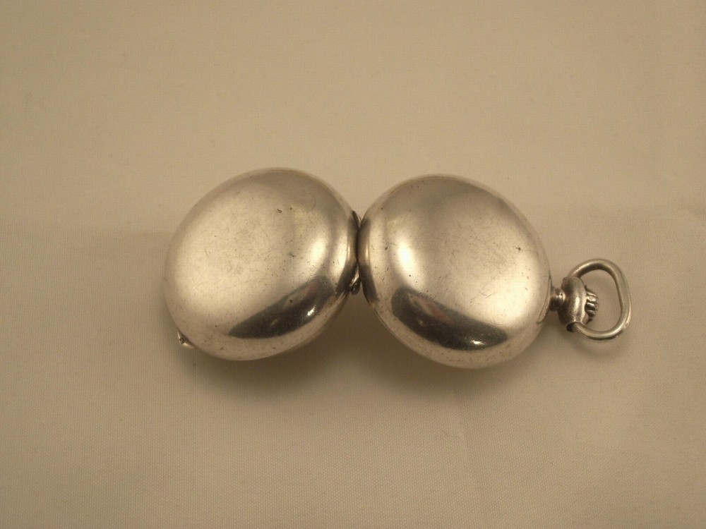 ANTIQUE SILVER COIN HOLDER