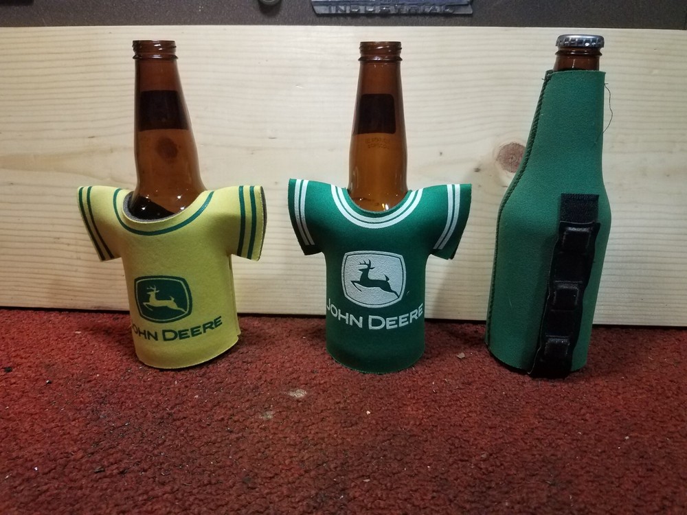 Three John Deere bottle cozys