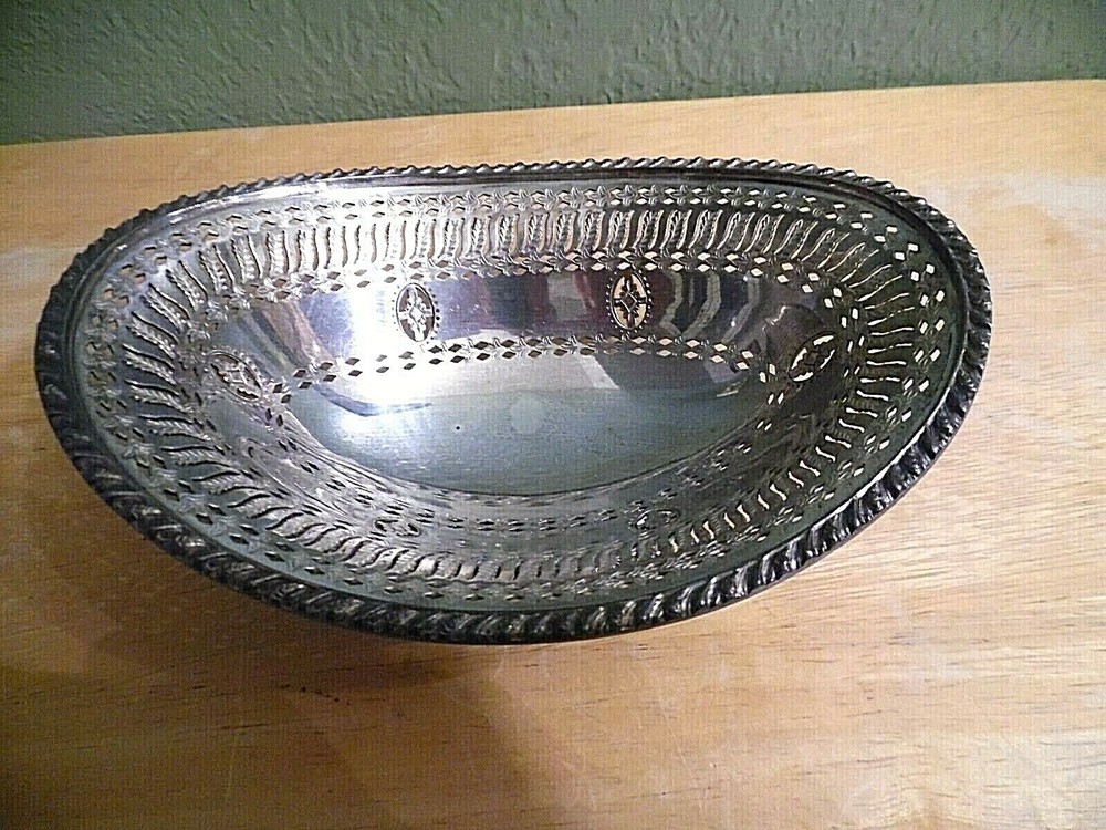 PIERCED SILVERPLATE OBLONG FOOTED CANDY DISH MADE IN ENGLAND WITH HALLMARK