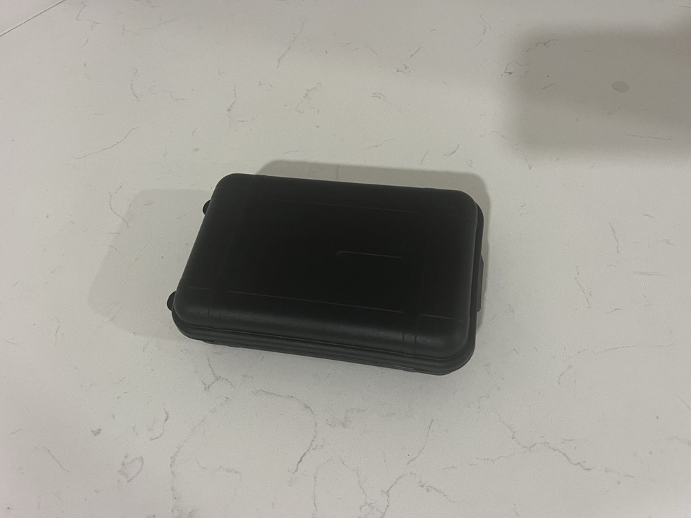 Small Black Plastic Lidded Storage Container with Foam Insert
