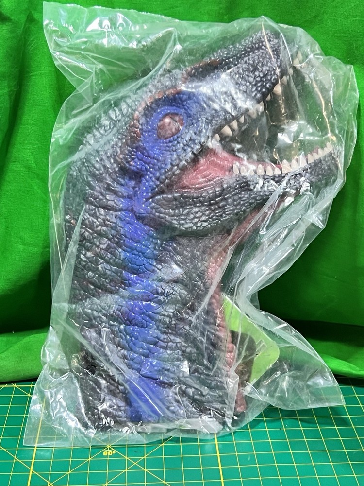 Velociraptor head childrens plastic hand puppet dinosaur
