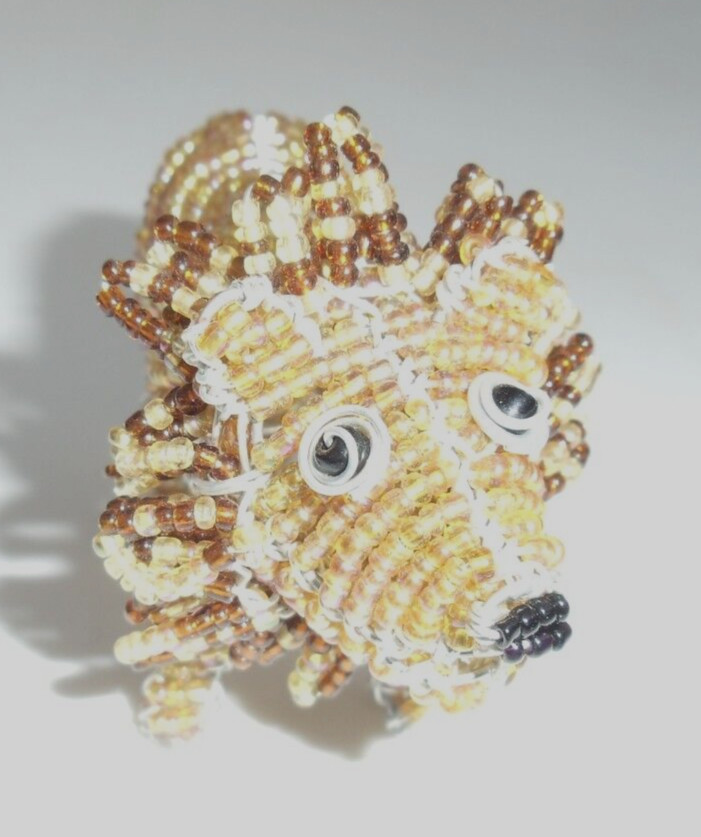 Beaded land: Miniature lion