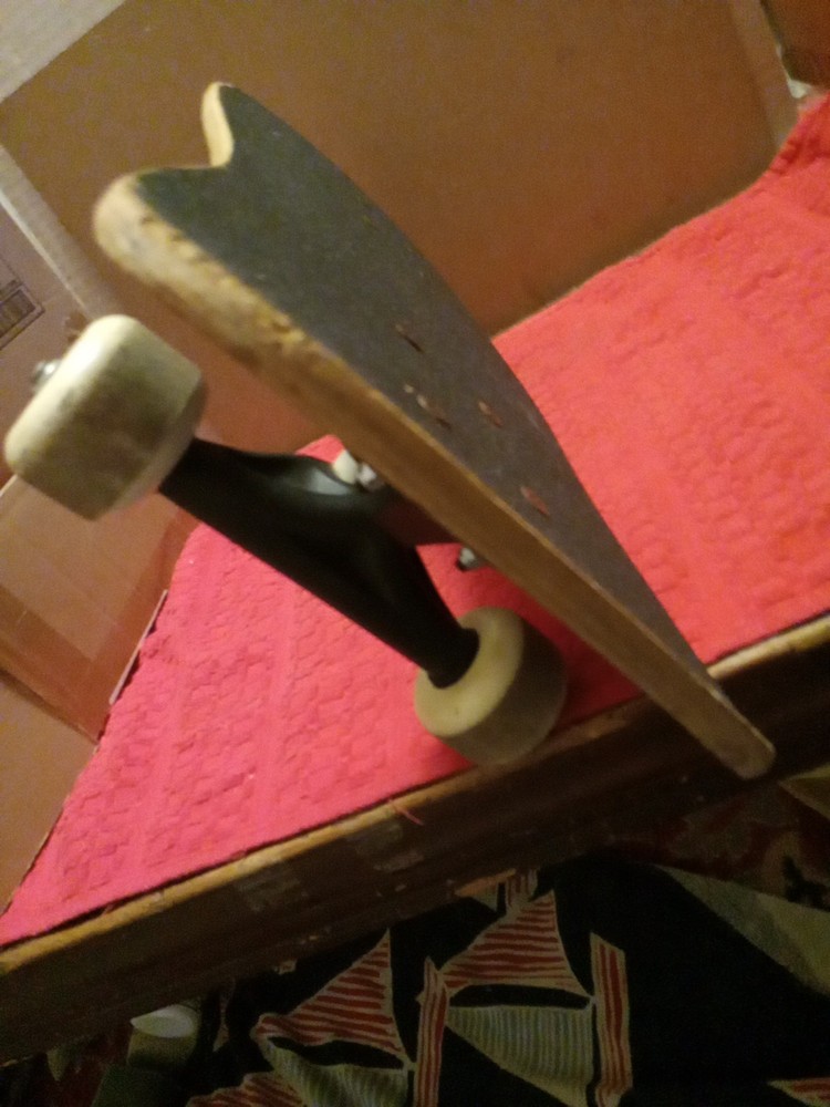 A VINTAGE 18inch×9 Scateboard .