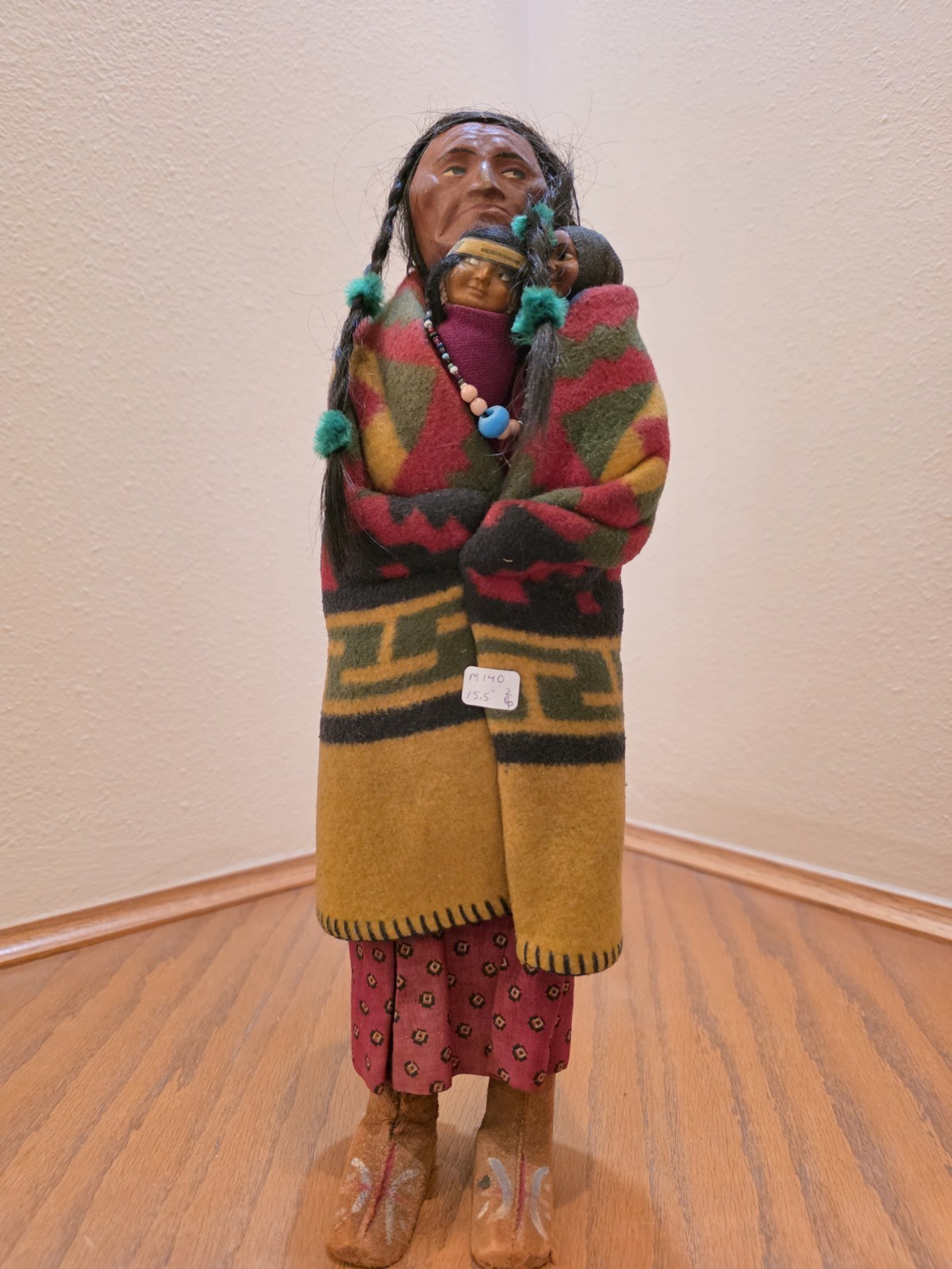 Rare Skookum doll. Left looker with twins.