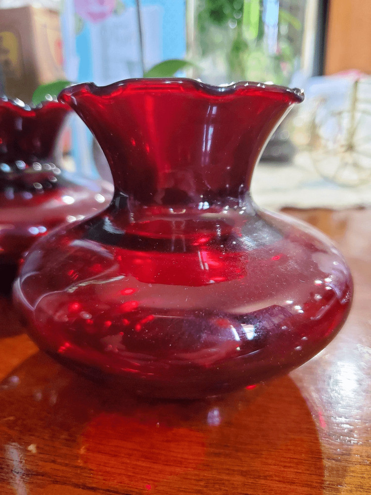 Two anchor Hocking Ruby Red bud vases
