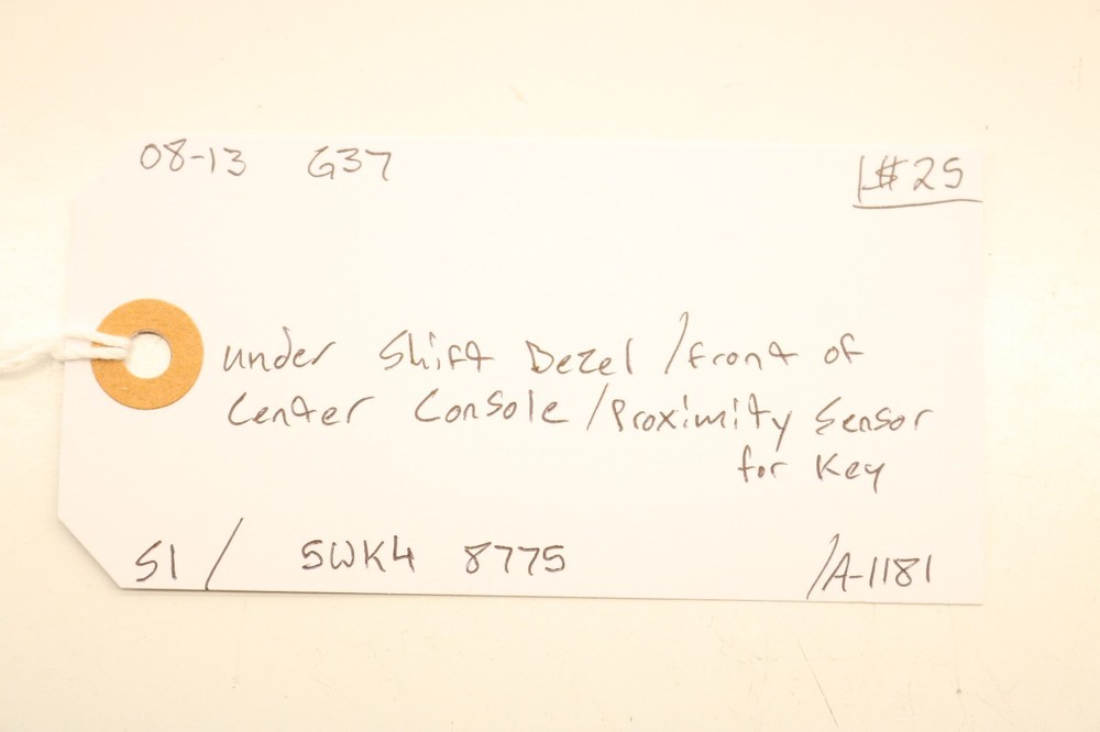 08-13 G37 KEY PROXIMITY SENSOR UNDER SHIFT BEZEL FRONT CENTER CONSOLE 5WK4 8775