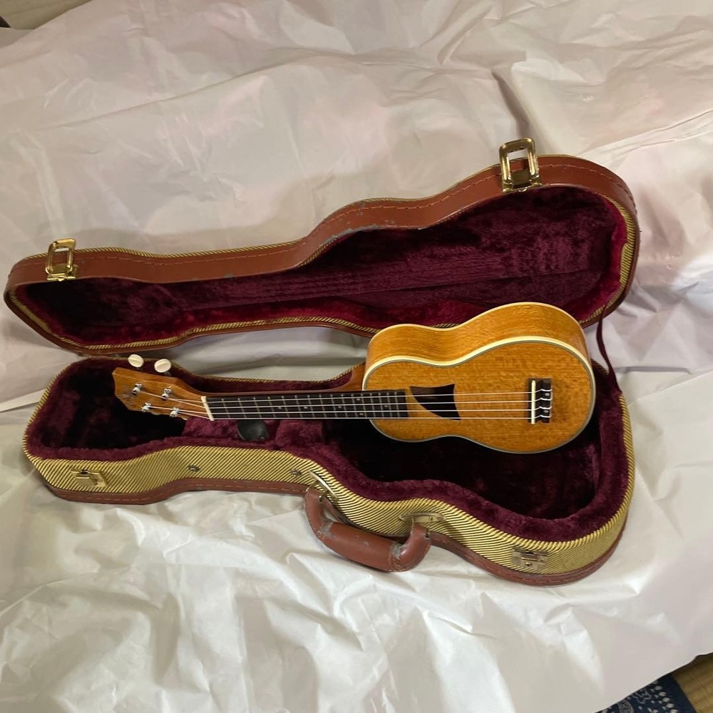 Soprano size ukulele and hard case