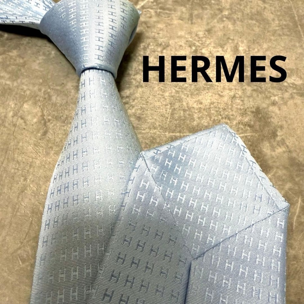 HERMES tie light blue fasone H pattern