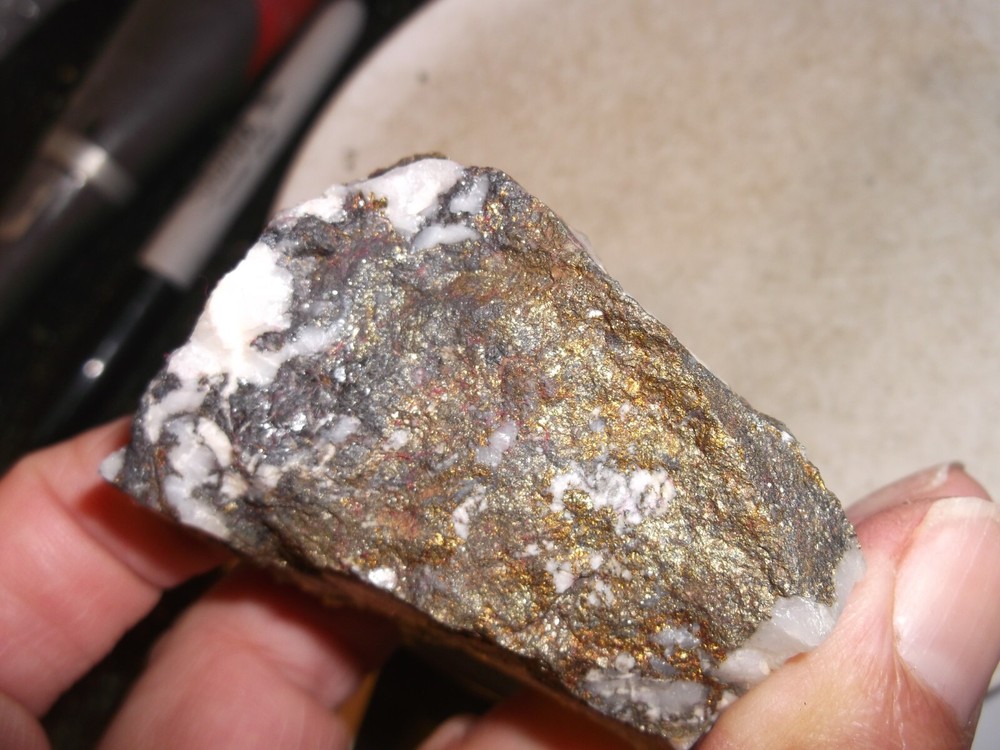 Gold, silver, copper, 166 grams samples ,ore high grade .