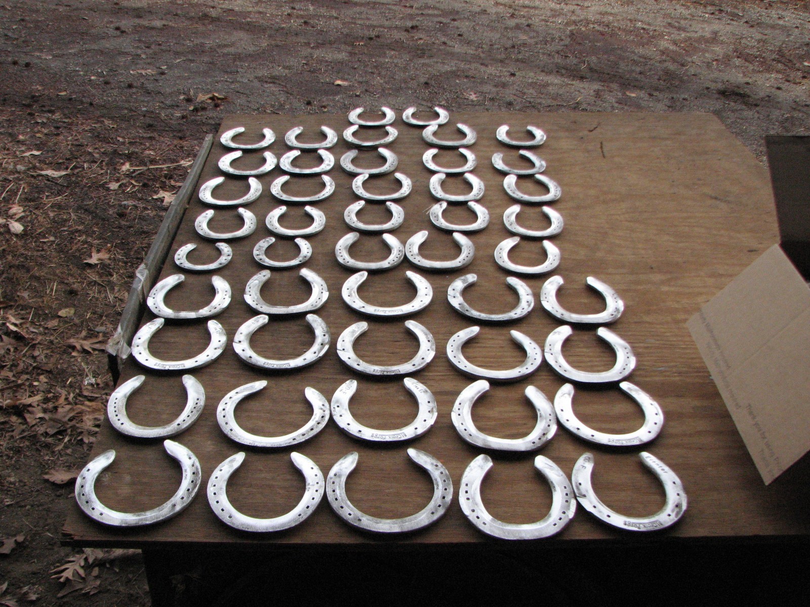 125 used aluminum horseshoes