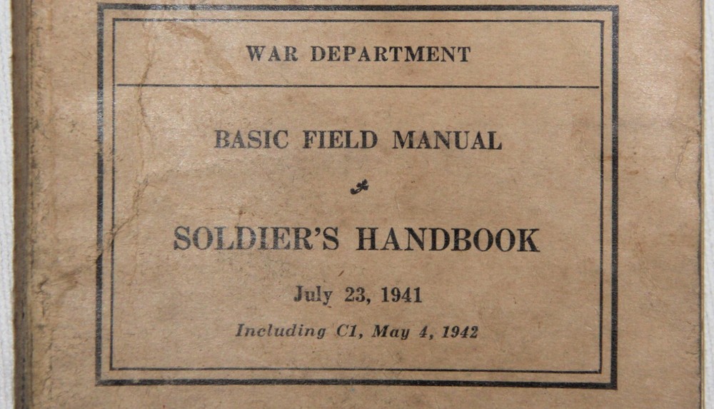 ORIGINAL NAMED WWII 1942 DATED SOLDIER'S HANDBOOK