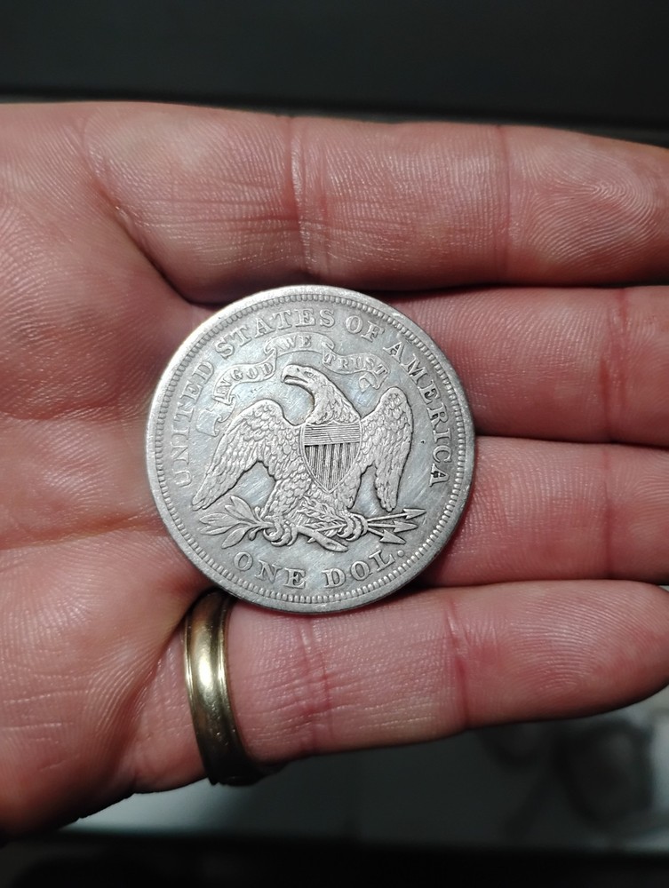 1871 seated dollar XF condition