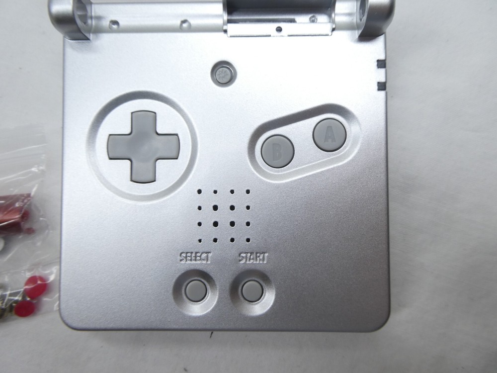 Gameboy Advance SP shell replacement Red/Silver Mario with new screen lens