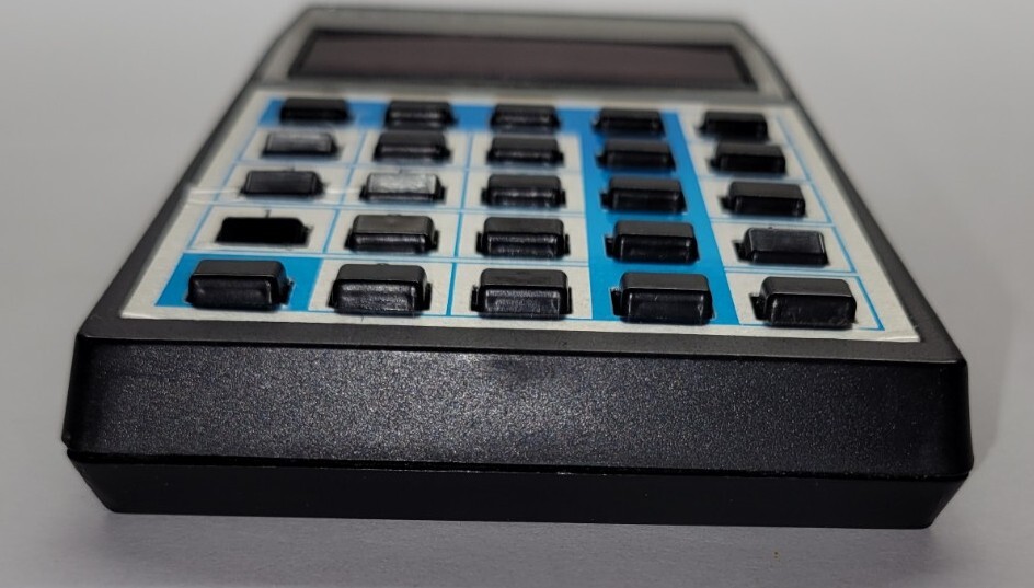 Unisonic Pocket Calculator Model 1541L Chipped Corner. UNTESTED