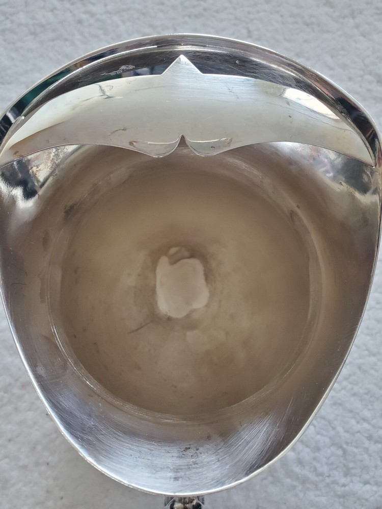 Cheeks Design &Art co. Silver plated footed pitcher