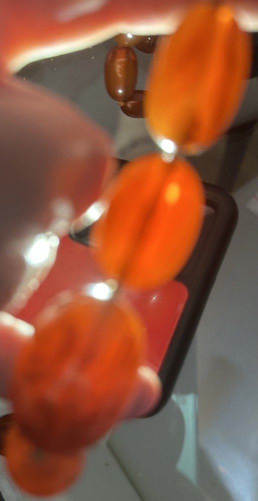 GORGEOUS BAKELITE AMBER GRADUATED LONG NECKLACE.