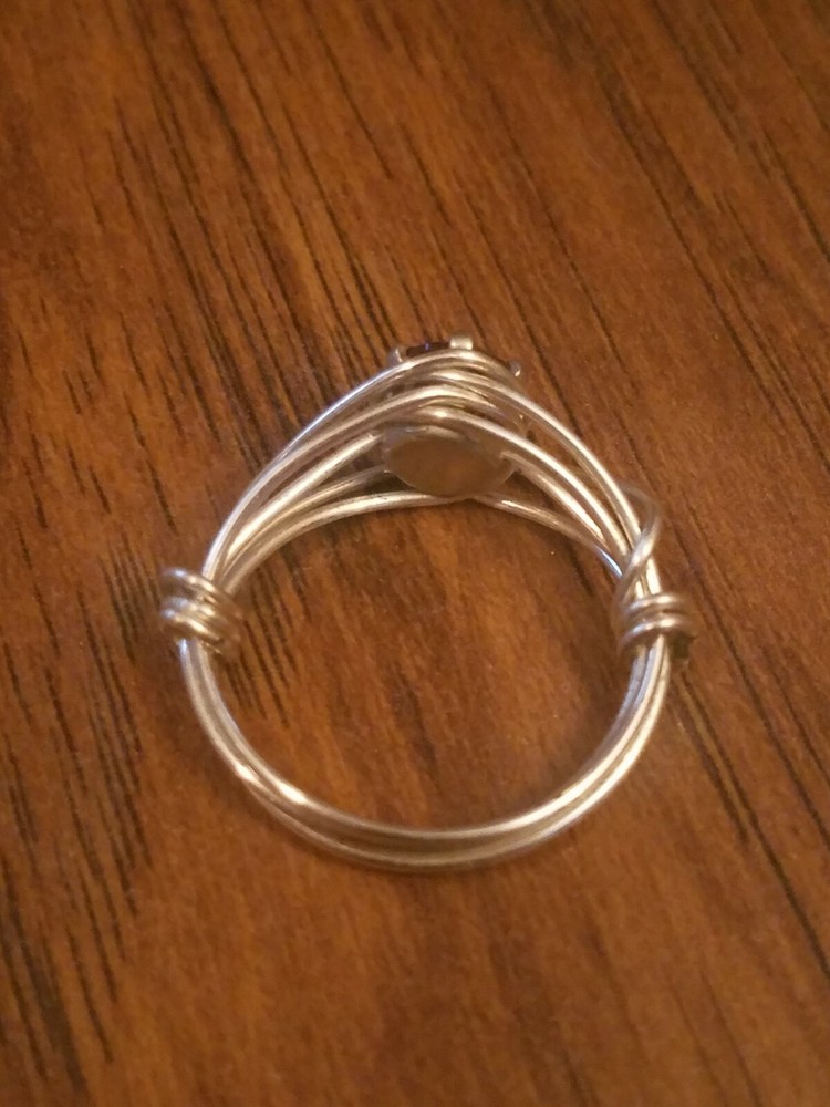 Wire wrapped ring with 6mm garnet CZ size 6.5 - 7