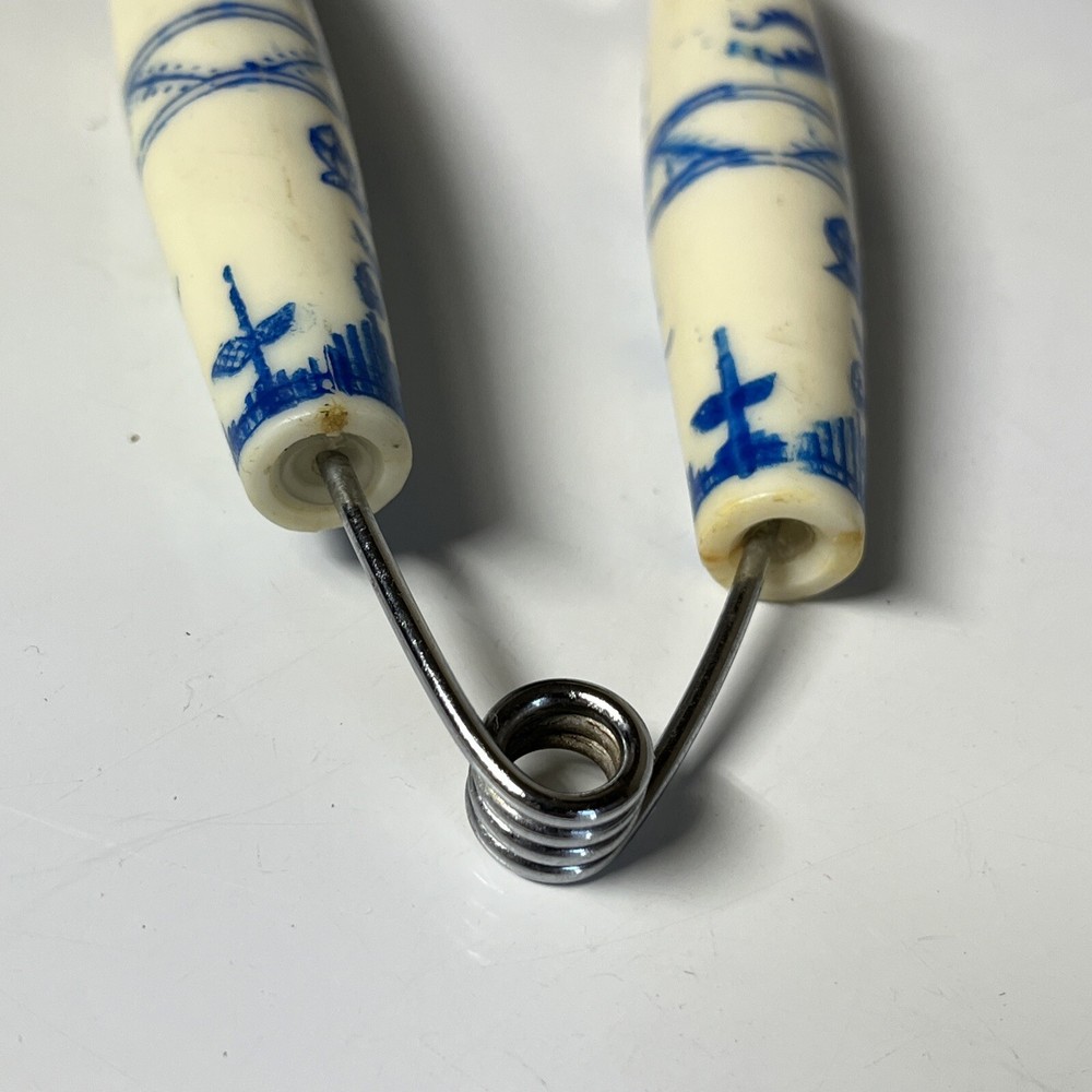 Bakelite White Blue Floral Spring Action Meat Serving Fork Slider
