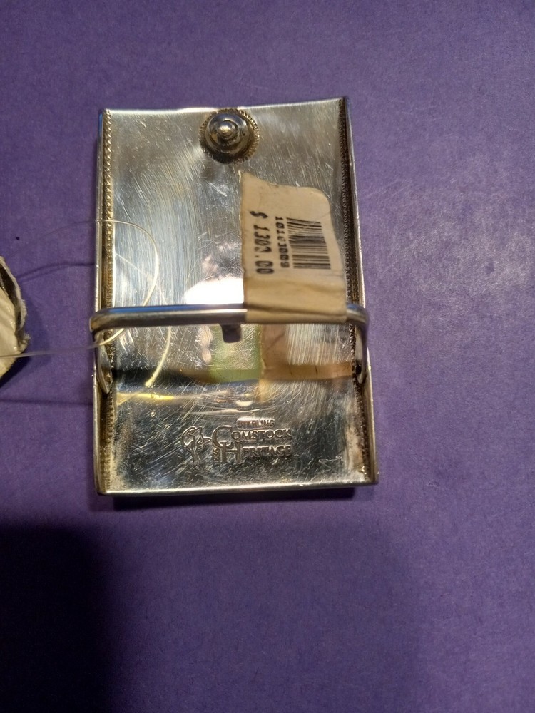 comstock silver belt buckle