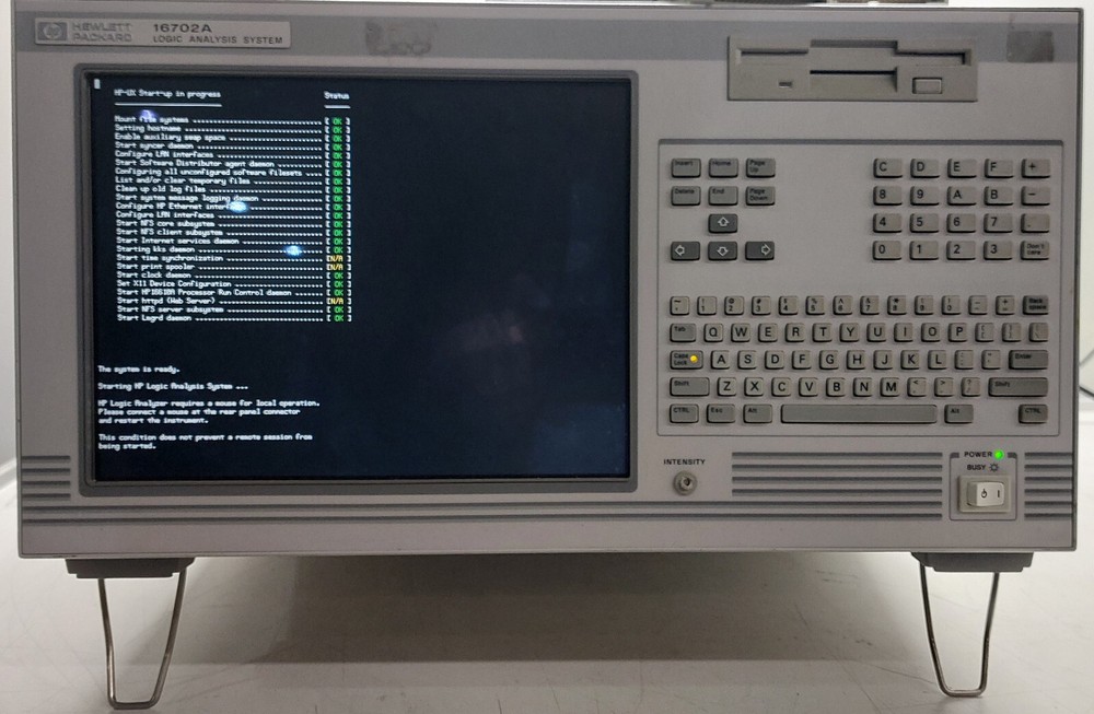 HP LOGIC ANALYSIS SYSTEM 16702A with Manual and cables included as shown