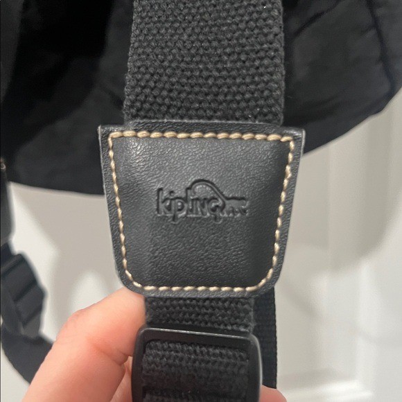 2003 Vintage Kipling Small Black Backpack with Tan Drawstrings