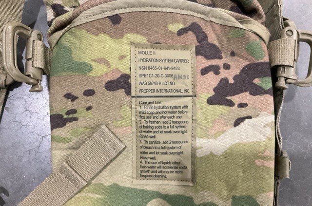 GENUINE US MILITARY MULTI-CAMO HYDRATION BACKPACK WITHOUT BLADDER.PRE OWNED USED