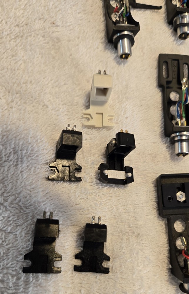 13 Turntable Headshells. 12 OEM Technics, One Pickering. Five P-Mount Adapters