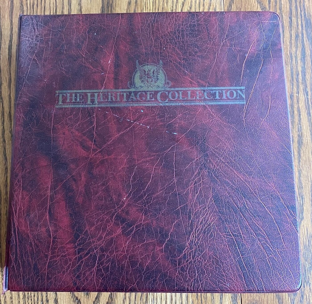 1893 - 1989 HERITAGE COLLECTION US COMMEMORATIVE STAMPS BINDER- WITH SOME STAMPS