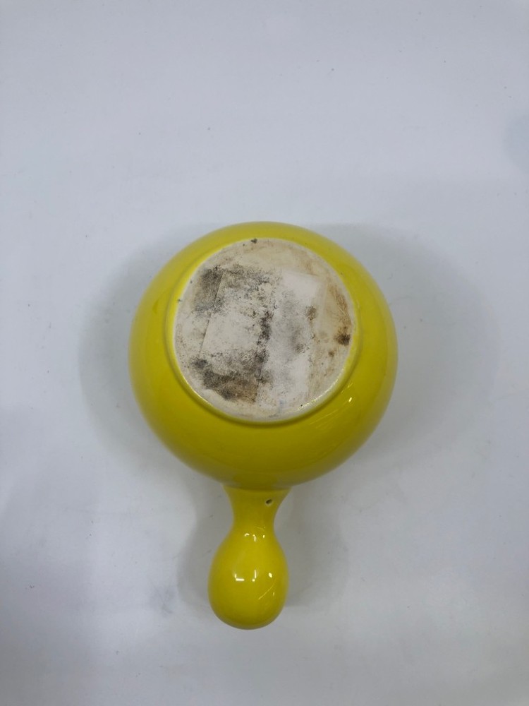 YELLOW CERAMIC SYRUP PITCHER.