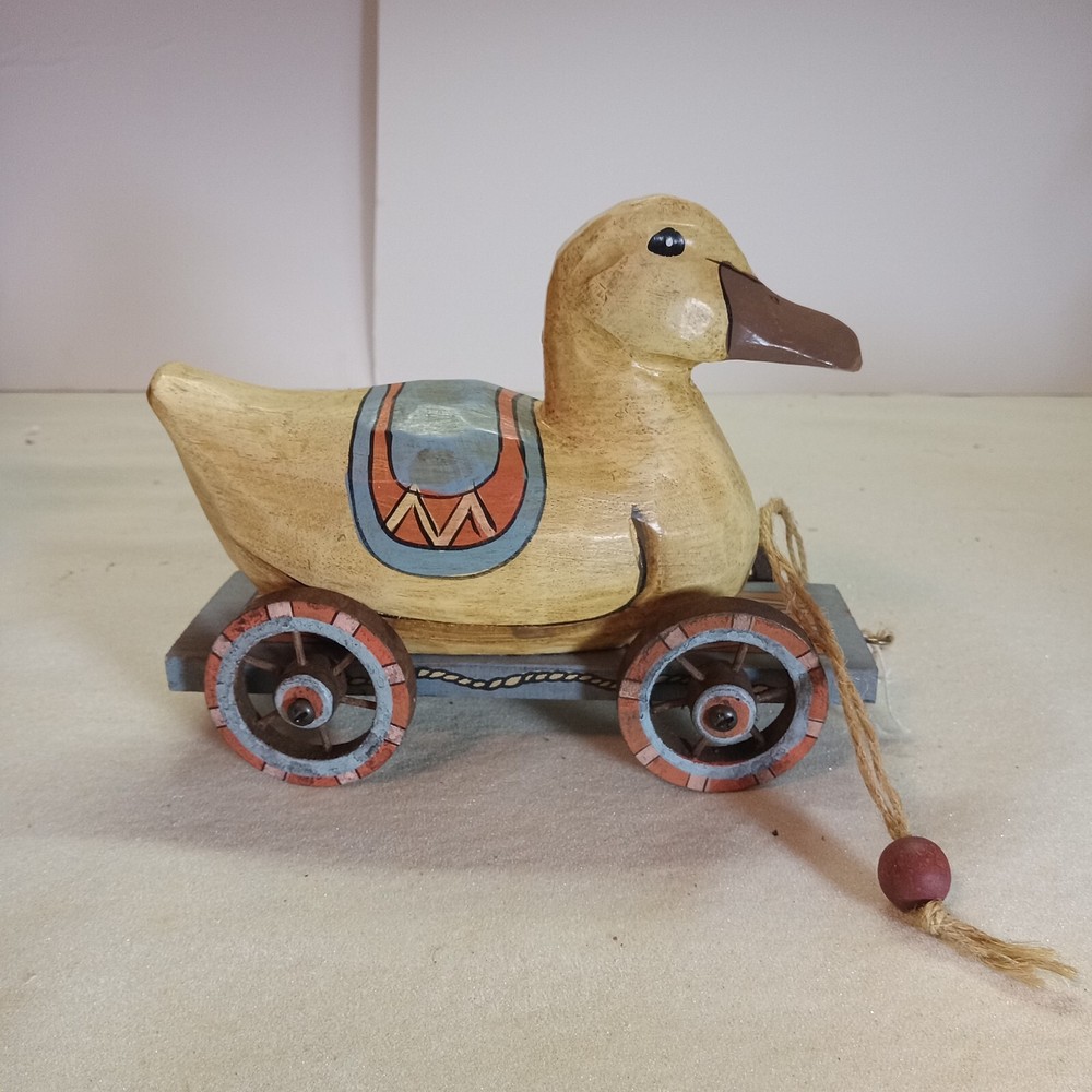 A bunny & duck on wheels pull toy