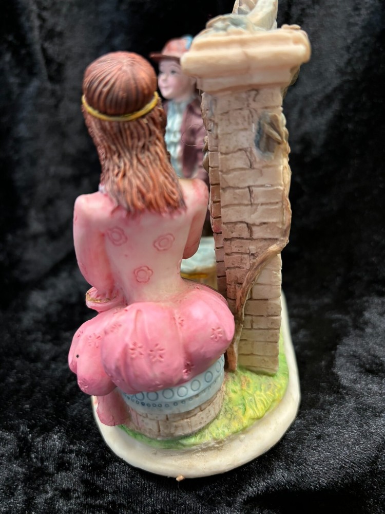Colonial Couple Figurine w/Clock Purple & Pink Clock Does not work