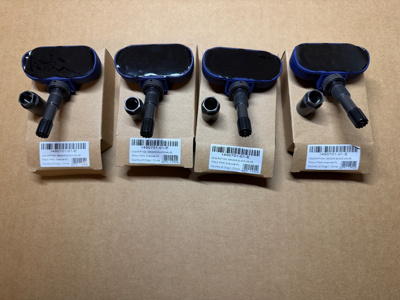 Set of 4 NEW OEM Tesla Model 3 S X Y Bluetooth TPMS Sensor with Nut 1490701-01-E